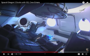 Inside Musk's Dragon. There are four portholes.