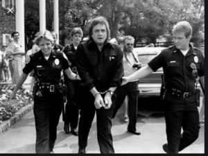 Johnny Cash in irons for a drug bust (I think). How could the Manson Family not get the same treatment? Answer: Because they are state actors.